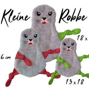 May include: Three gray plush seal toys with embroidered faces. The largest seal is 18 inches by 30 inches, the middle seal is 16 inches by 26 inches, and the smallest seal is 13 inches by 18 inches. The seals have red and green fabric ties.