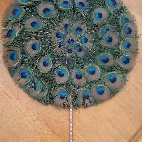 Beautiful vintage circulation peacock feather fan handle