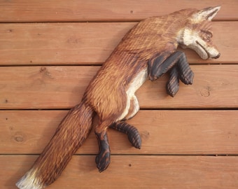 carved wooden fox