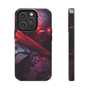 May include: A phone case featuring a digital art design of a futuristic warrior with red glowing eyes and a red cloak. The case has a black border and a glossy finish. The design is detailed with shades of red, purple, and gray.