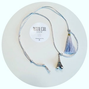 OUI PARIS! || Super Cute little shiny Eiffel Tower with sparkles. Silver tassel and silver silk cord