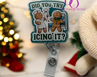 May include: A teal blue glitter badge holder with a gingerbread man and a gingerbread nurse with the text "Did you try icing it?"