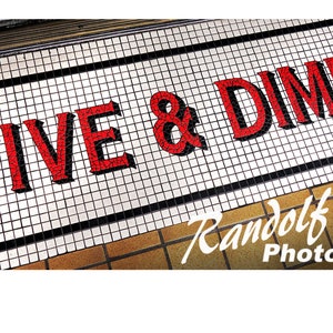 Iconic old Five & Dime department store floor entrance sign.