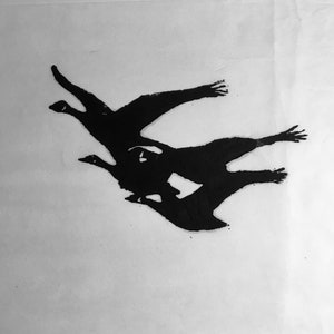 May include: Black and white silhouette of three geese flying in formation.