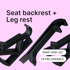 Può includere: Componenti neri in plastica per schienale e poggiagambe. L'immagine include il testo "Seat backrest + Leg rest", "SNAP-AND-GO" e "EXTRA DURABLE" su sfondo rosa.