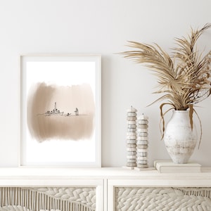 Könnte beinhalten: Ein gerahmter Druck mit einer minimalistischen Linienzeichnung einer Stadtlandschaft mit einem braunen Aquarellhintergrund.