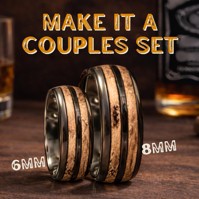 May include: Two rings featuring a dark metallic band with a central inlay of textured light brown wood. The text MAKE IT A COUPLES SET is displayed above, with 6MM and 8MM labels indicating the width of each ring respectively.
