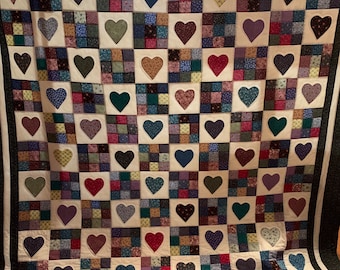 Homemade King Size Heart and nine patch quilt