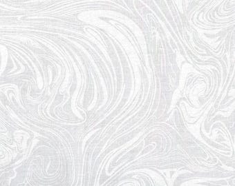 May include: A close-up of a white and light gray fabric with a swirling, marbled pattern. The design features flowing, curved lines that create a sense of movement and texture. The fabric appears to be a linen or cotton blend.