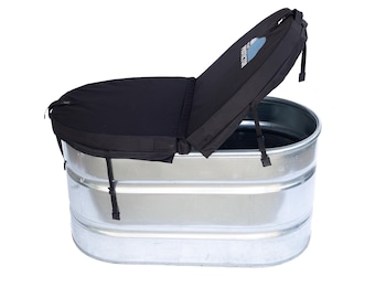 May include: A galvanized steel stock tank with a black cover. The cover is partially open, revealing the interior of the tank. The cover has the word "PROTECTOR" printed on it. The tank is rectangular with rounded corners.