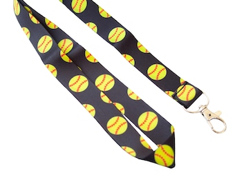 May include: Black lanyard with a repeating pattern of yellow softball graphics. The lanyard has a silver swivel clasp.