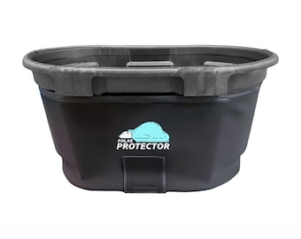 May include: A black, oval-shaped container with a gray rim and the words "POLAR PROTECTOR" and a light blue polar bear logo. The container has a handle on the front and is designed to hold items.