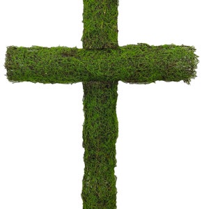 May include: A decorative cross covered in vibrant green moss. The cross is made of a sturdy material and is suitable for indoor or outdoor display. The moss provides a natural, textured appearance.