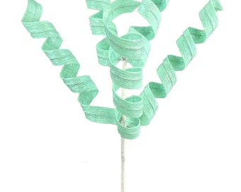 May include: A single stem with multiple green, curled ribbon streamers attached. The streamers are made of a shiny, iridescent material.