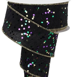 May include: Black ribbon with gold, green, and purple confetti. The ribbon has a wired edge.