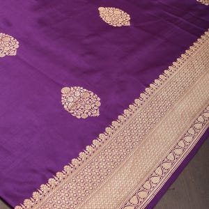 Peach Budget Silk Saree, Adorned with Zari Buttas All Over Its Body, Complemented by a Contrast Traditional Zari Design Woven Rettai Pettu Border, Sparsely Woven Pallu, and Paired with a Contrast Blouse