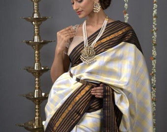 PREORDER: Checks with Korvai Border Gadwal Pure Silk Saree in Butter Yellow and Heather Gray  | SILK MARK Certified