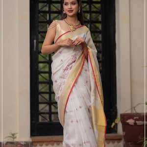 Shobitam Exclusive - bestickte Rangoli Borte auf reinem Leinen von Linen Sari in Weiß, Rot und Gold
