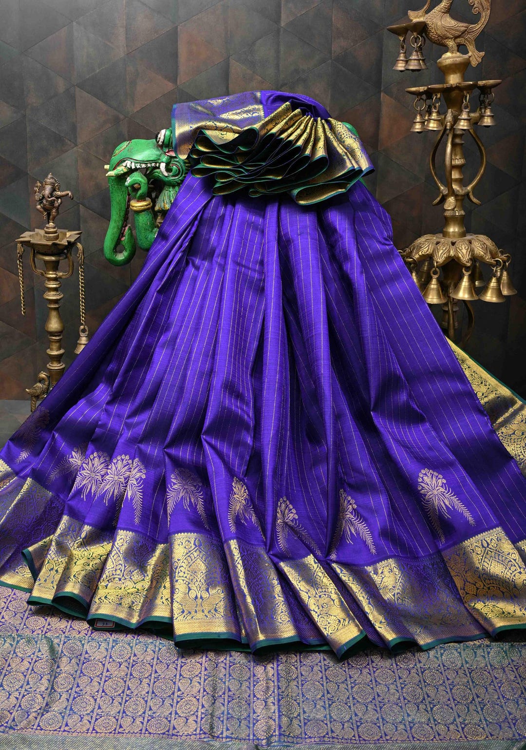Navy Blue Kanjiwaram Satin Silk Saree with embossed saree and Zari floral motifs
