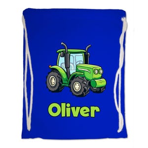 May include: A blue drawstring bag with a green cartoon tractor and the name Oliver printed in green.