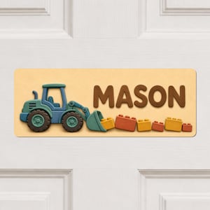 May include: A rectangular wall sign with a light yellow background featuring a teal tractor on the left side. The name MASON is written in large brown capital letters to the right, followed by a row of small orange and yellow building blocks.