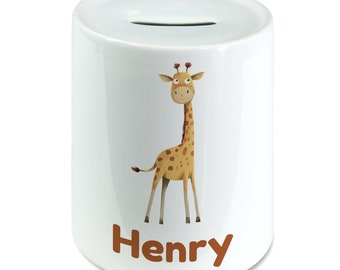 May include: White ceramic money box featuring a cartoon giraffe design and the name "Henry" printed in brown.