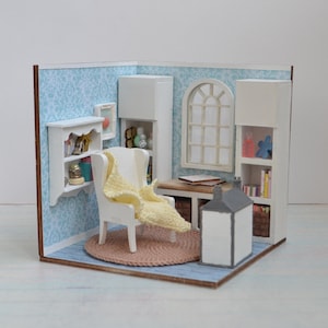 Miniature roombox 1 12 scale cozy dollhouse scene with white armchair bookshelves woven rug and pastel decor for blythe display photography