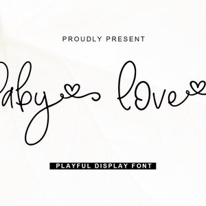 May include: A white background with the words "Baby love" written in a playful, cursive font. The word "Baby" has a heart symbol. The text "PROUDLY PRESENT" and "PLAYFUL DISPLAY FONT" are also present.