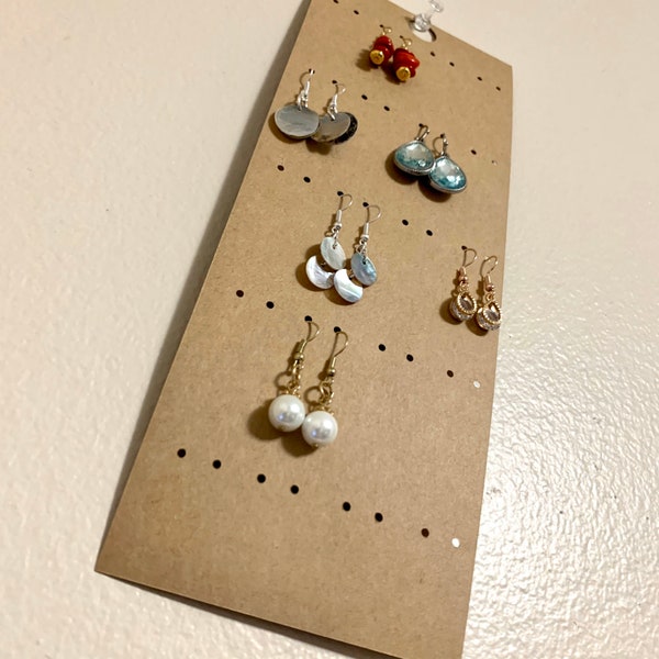 Card stock earring cards. Perfect for holding earrings to display or sell. Set of four, holds 20 pairs.