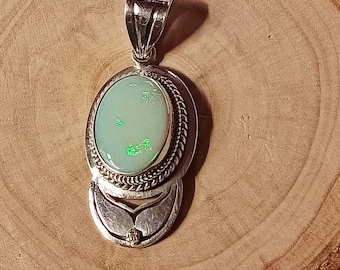 Ethiopian Opal 925 Sterling Silver Pendant: Oval Gemstone