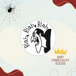 May include: Black and white embroidered patch featuring a cartoon character with the text "Blah Blah" around the character. The patch is on a white background.
