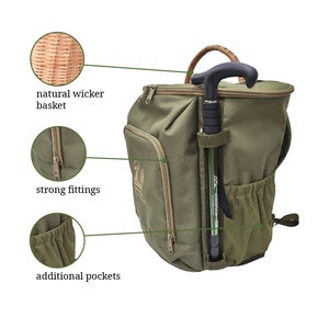 May include: Green canvas backpack with a wicker basket, a walking stick holder, and multiple pockets. The backpack has strong zippers and a mesh pocket.