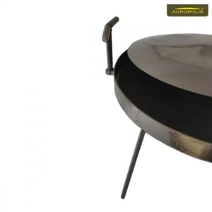 May include: A black metal brazier with a round cooking surface and a hinged lid. The brazier has three legs and a handle on the lid.