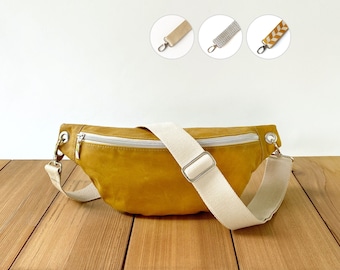 Soft zippered belly bag from waxed cotton (oilskin) with several strap options and 2 pockets inside, lightweight yellow cross body bum bag
