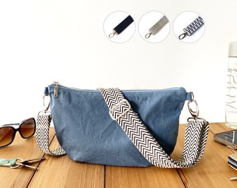 soft denim blue minimal half-moon bag, zippered dumpling crossbody bag, trendy slouchy chest bag from durable waxed cotton fabric, women