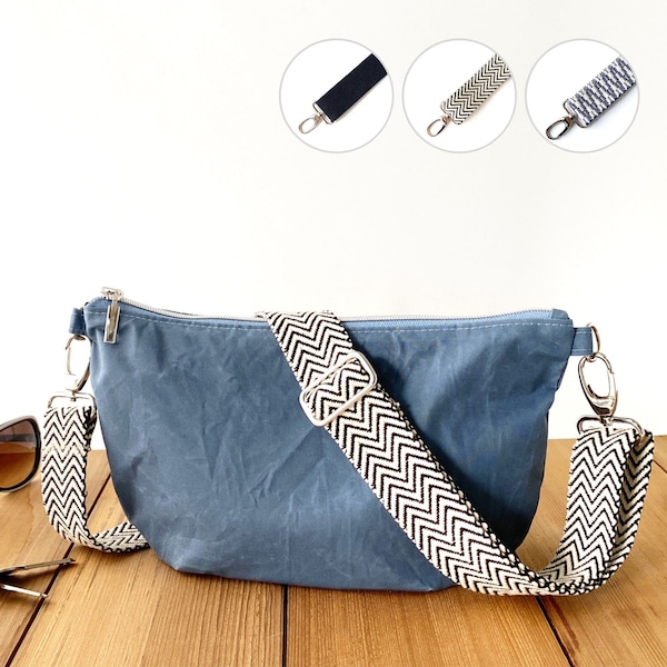 soft denim blue minimal half-moon bag, zippered dumpling crossbody bag, trendy slouchy chest bag from durable waxed cotton fabric, women