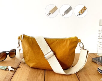 soft and slouchy zippered half-moon purse with wide detachable strap, casual roomy chest bag from lightweight waxed fabric, dumpling bag