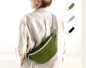 Soft and slouchy bum bag with wide cotton strap made from green waxed cotton (oilskin), small crossbody banana bag for festival and travel