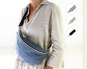 denim blue soft bum bag made from waxed cotton (oilskin), vegan belt bag with silver zipper, slouchy banana bag with wide strap men, women