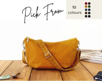 mustard yellow small slouchy shoulder bag, trendy fabric half-moon bag, casual soft banana sling bag with zipper, minimal cross-body bag