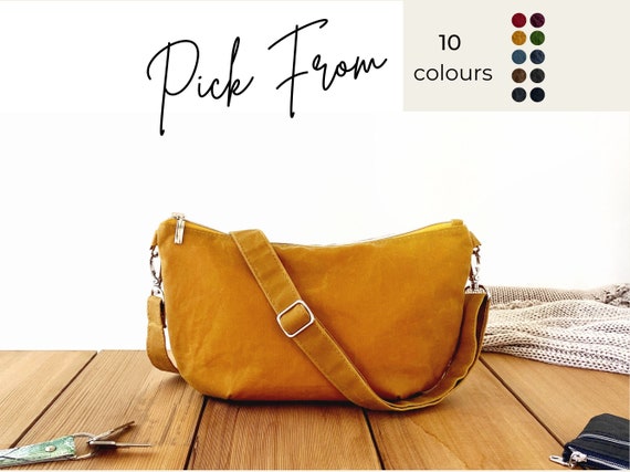 mustard yellow small slouchy shoulder bag, trendy fabric half-moon bag, casual soft banana sling bag with zipper, minimal cross-body bag