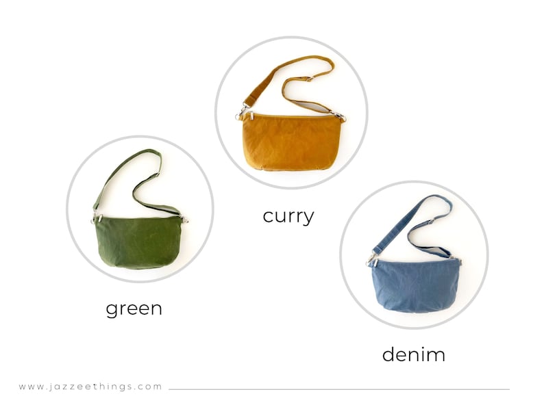 May include: Three small crossbody bags in different colors: green, curry, and denim. Each bag has a long adjustable strap.