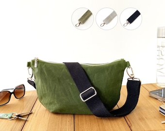 green lightweight halfmoon bag from waxed cotton fabric, wear underarm or crossbody, zippered and fully lined banana dumpling bag women