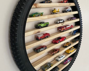 Wheel-shaped shelf for cars and motorcycles