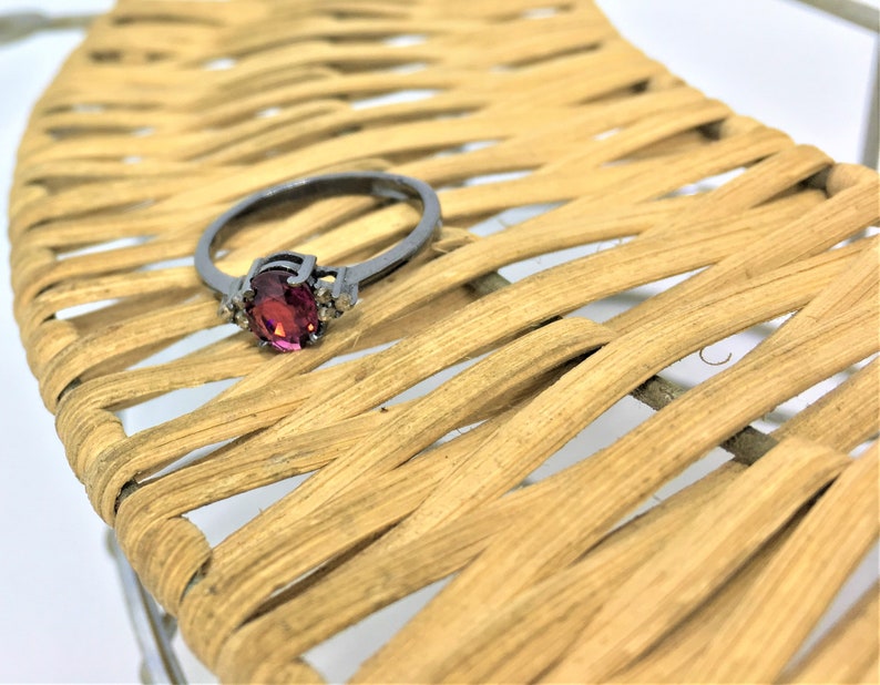 Rhodolite garnet and diamond ring in sterling silver.