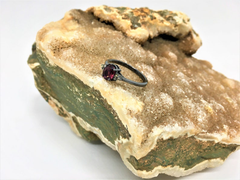 Rhodolite garnet and diamond ring in sterling silver.