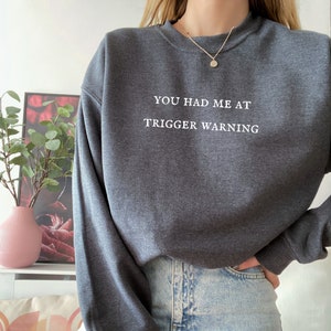 You had me at trigger warning crewneck unisex sweatshirt | cozy bookish jumper, reader gifts, bookworm gift, bookish sweatshirt