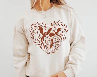 Sudadera Dragon Heart: cuello redondo unisex de Bookish
