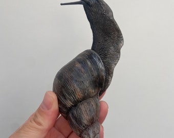 Freestanding polymer clay snail-based on African land snails