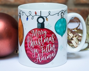 Xmas mugs. Merry Christmas Ya Filthy Animal. Home Alone print. Office mugs. Unique coffee mugs. Coffee accessories.